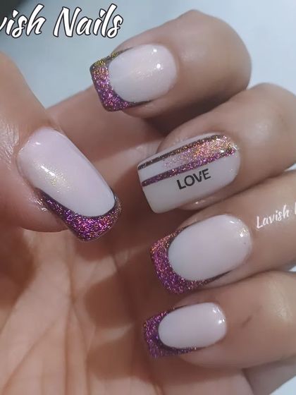 A creative French manicure with a sparkling purple glitter tip and a "LOVE" text accent nail. This design is perfect for expressing a personal message.