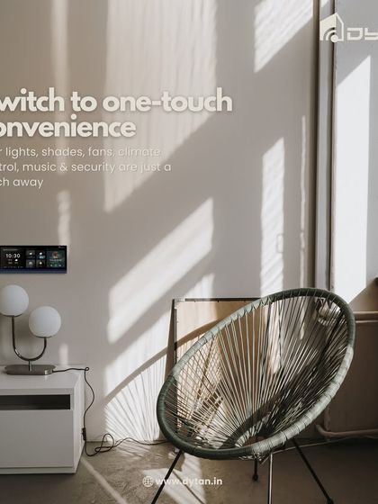 Switch to the convenience of one-touch control. The HomePad, shown here in a minimalist reading corner, puts all your home's functions at your fingertips.