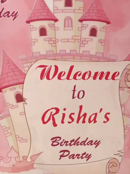A personalized welcome sign for Risha's princess-themed birthday party, setting the magical tone right from the entrance.