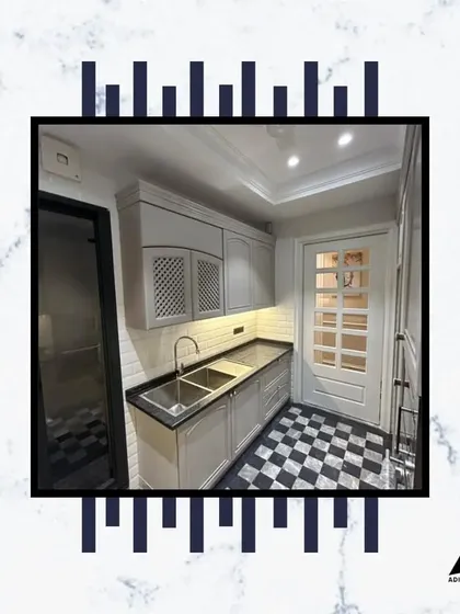 This view shows the thoughtful layout of our kitchen, with the sink, stove, and storage all within easy reach, making it a highly functional workspace.