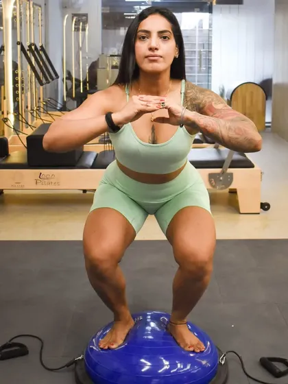 The Bosu ball is one of my favorite tools for improving balance and core strength. Performing squats on an unstable surface like this forces your stabilizing muscles to work harder, leading to better overall stability.