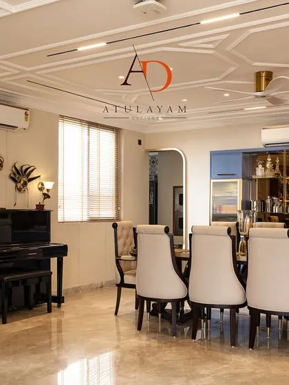 Another view of the dining area, highlighting the placement of a piano and decorative masks, adding a personal and artistic touch to the space.
