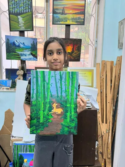 A resting deer in a misty forest. This student did a fantastic job using the blur technique to create a dreamy, gentle atmosphere in her artwork.