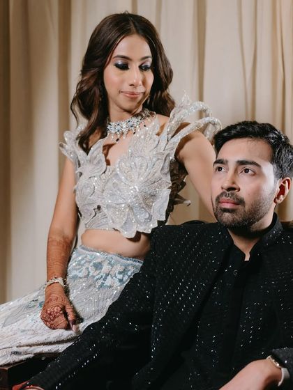 A posed shot of the couple, looking like they stepped out of a magazine.