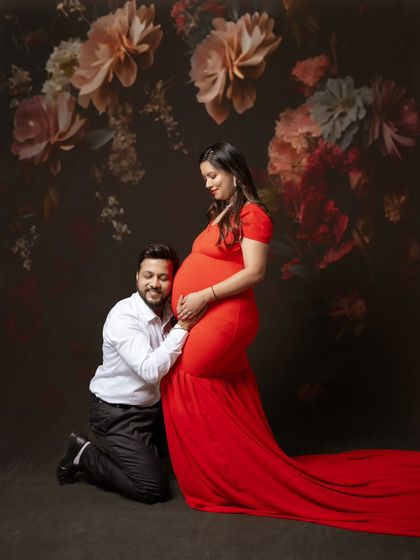 Listening to the sweetest heartbeat, creating the most precious memories. This classic portrait shows a dad-to-be connecting with his unborn child in a moment of pure love.