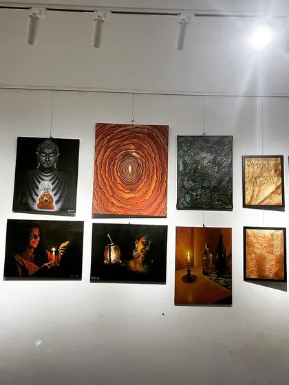 Another view of my paintings on the gallery wall.