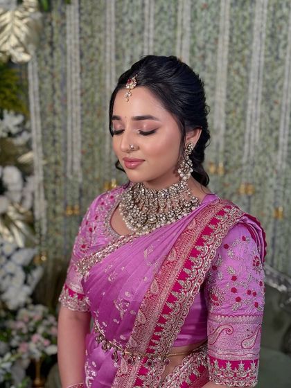 Eyes closed, this shot gives a perfect view of the subtle and shimmering eyeshadow.