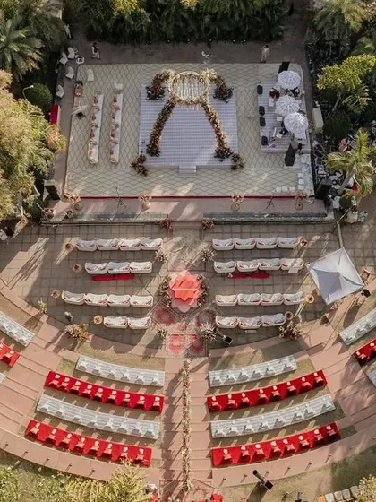 A bird's-eye view of the amphitheater seating for our 'Regal Rustic Reverie' wedding. The tiered arrangement ensured every guest had a perfect view of the stunning mandap and the sunset ceremony.