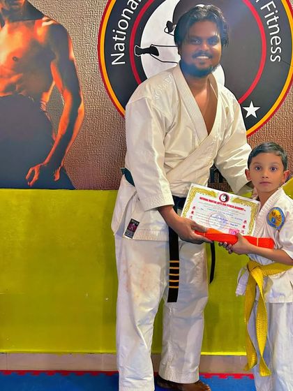 National Martial Arts and Fitness Academy - Kids Martial Arts & Fitness The Journey of Discipline: Belt Graduations photo 25