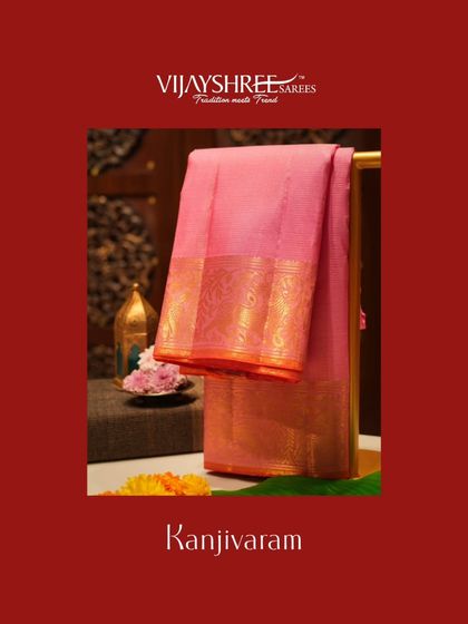 A soft pink Kanjivaram with a classic gold border, a timeless and elegant choice.