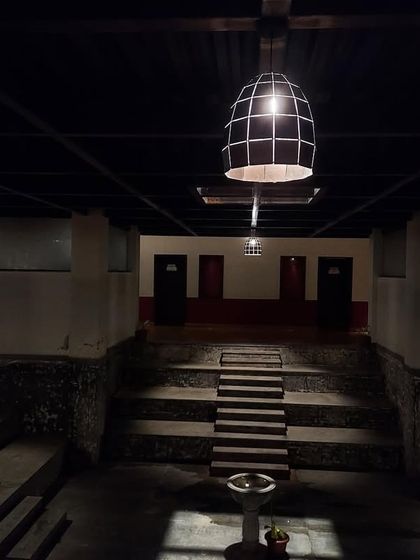 The quiet ambiance of our central courtyard at night. The minimalist lighting and traditional architecture create a space that feels both sacred and serene.