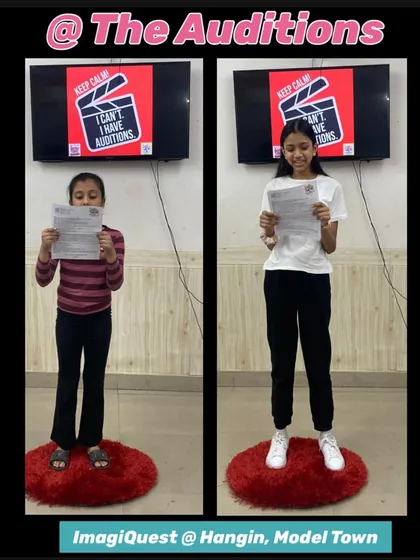 More aspiring actors auditioning for "The Dream Chasers". This image shows two girls focused on their scripts, demonstrating the interest and enthusiasm our theatre programs generate.