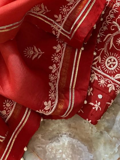 A detail shot of the dupatta border, with its gota and seed pearl embellishments.