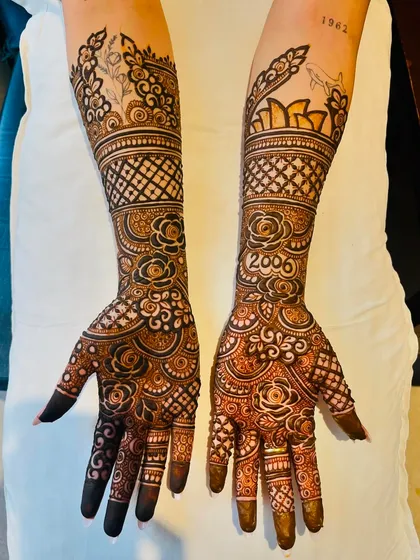 A full view of the custom bridal design, showing how I incorporated personal elements like dates and existing tattoos.