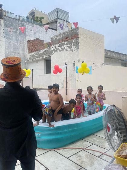 A view from behind the magician, showing the kids enjoying the pool party. We can provide entertainment for any kind of party setup.