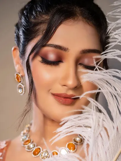 A close-up of the soft, smoked-out eye makeup from our masterclass. We teach students how to blend colors seamlessly to create depth and dimension for a professional finish.