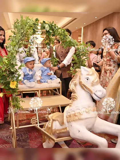 A special moment as the twin birthday boys make their entrance in a beautiful horse-drawn carriage prop. This adds a touch of fairytale magic to their "First Trip Around the Sun" celebration.