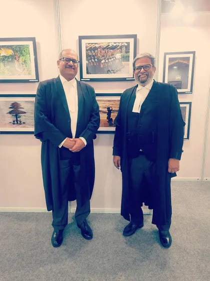 Posing with a fellow senior advocate. Mutual respect and camaraderie are the bedrock of the bar.