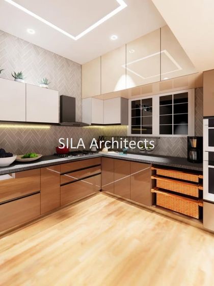 A render of a modern kitchen design, featuring dual-tone cabinets, built-in ovens, and wicker baskets for vegetable storage, combining aesthetics with practical solutions.