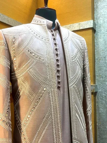 Every journey to exquisite style begins at Manhar. We invite you to explore our luxurious silk sherwani collection and find your perfect wedding look.