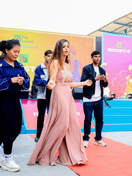 Leading a dance and getting the crowd to participate at the Big Basket Rockstar event.
