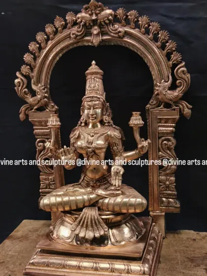 Another view of the Mahalakshmi with Prabhavali, showing the intricate carvings on the arch and the goddess's graceful form.