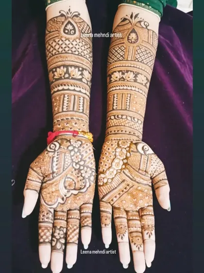 The beauty of a developed henna stain on a full bridal design. This pattern combines traditional motifs with negative space to make the core elements pop, showing the depth of color I achieve.