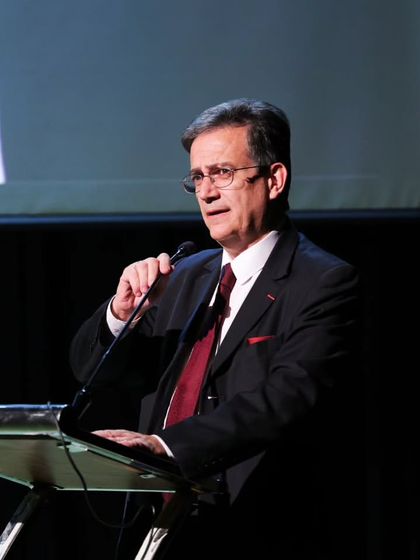 H.E. Thierry Mathou, Ambassador of France to India, addresses the audience. The presence of high-level diplomats underscores the cultural importance of our events.