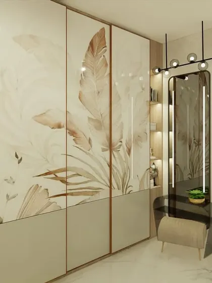 The walk-in wardrobe area features custom-printed glass shutters with a feather motif, adding a soft, artistic touch.