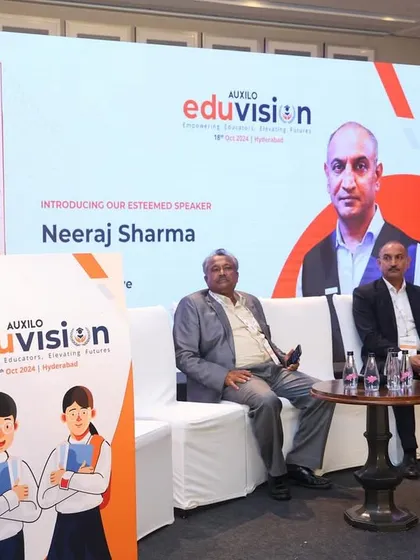 On stage at the Auxilo Eduvision conference. I am adept at hosting educational events, introducing esteemed speakers and moderating discussions on the future of learning.