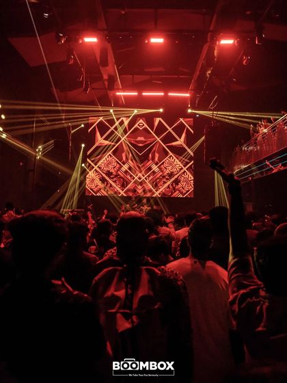 The packed dance floor at F Superclub, with the crowd completely lost in the music and the visuals.