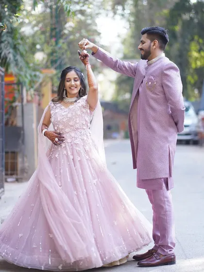 A lovely couple moment featuring our pastel pink gown. The floral applique work on the gown gives it a romantic, fairytale feel, perfect for an engagement shoot.