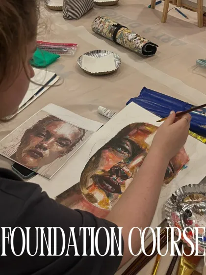 A student works on a portrait painting, an example of the kind of project undertaken in my comprehensive foundation art course.