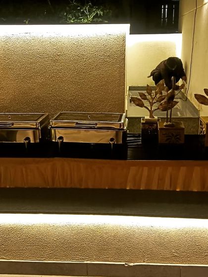 A stylish buffet arrangement for a house party of 40, perfectly integrated with the home's modern decor.