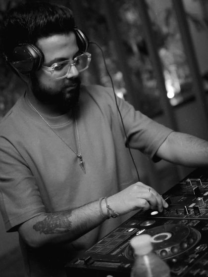 Another artistic black and white photo showing me deep in concentration, crafting the perfect set.