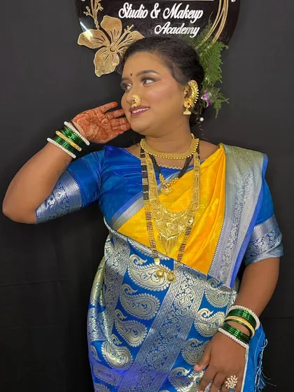 A happy, candid moment that captures the model's personality and the radiance of her makeup.