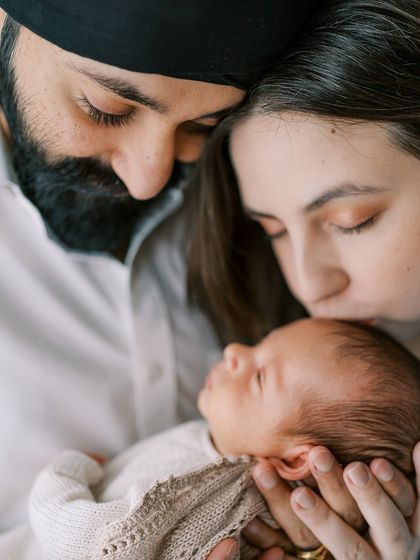 A one-month-old baby, so tiny and new. I love capturing all the little details, from their tiny fingers to their sleepy yawns.