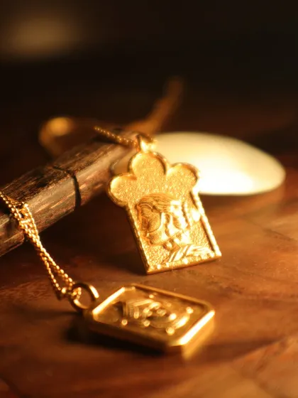 Another angle of my Devi and Queen pendants, showing the beautiful texture and detail in each piece.