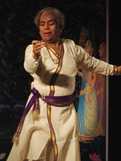 A classic performance photograph of the legendary Pt. Birju Maharaj, our Guru and the guiding light of our parampara. His legacy is the foundation of everything we do.