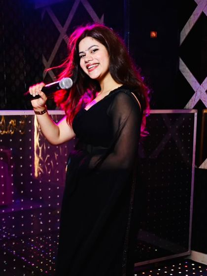 A candid shot of me enjoying the music at a cocktail party. It's important to feel the vibe to be able to set the vibe.