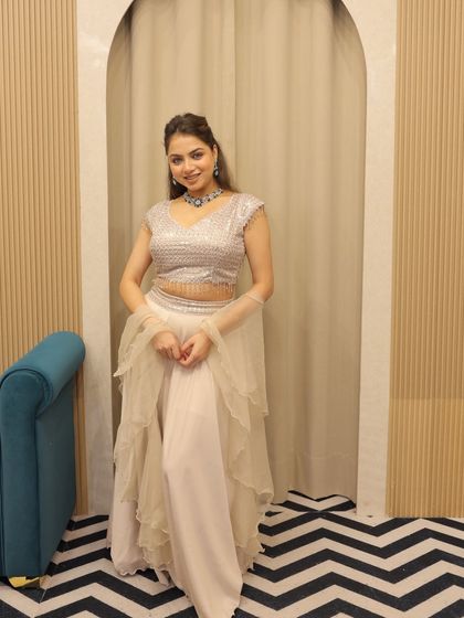 Rent and slay. This simple yet elegant sharara set is a comfortable and stylish option for any wedding guest.