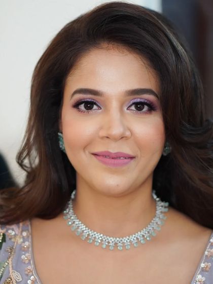 A lovely portrait of Nilofar, showcasing her elegant engagement makeup. The look is balanced and polished, allowing her natural beauty to be the focus.