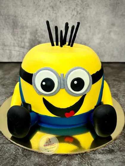 A slightly different angle of the Minion cake, showing off his full, rounded shape and spiky hair. This one was a delicious banana chocolate truffle flavour.
