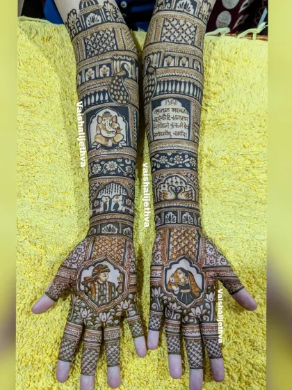 The complete view of a grand bridal design. From the palace tops near the elbows to the portraits on the palms, every part of this mehndi is filled with intricate details and symbols.