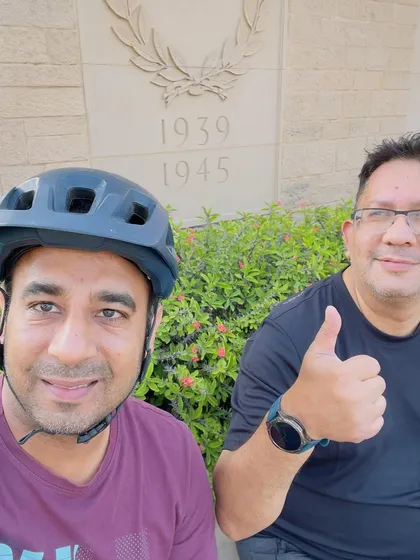 A thumbs-up from a member at the Delhi War Cemetery. Our rides are also a time for reflection and respect.