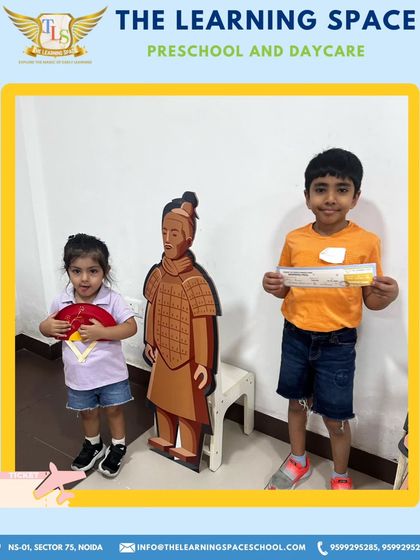 Posing with a Terracotta Warrior cutout and a traditional fan, our campers get their first taste of Chinese culture. These thematic photo opportunities make the experience more immersive and memorable.