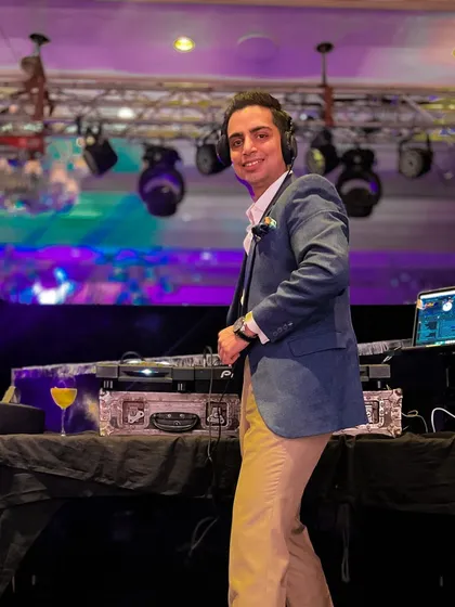 Keep them rolling, they said. And I never stop. A candid shot of me enjoying the party from behind the console.