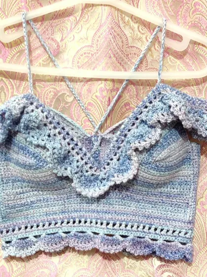 Showing that crochet isn't just for accessories. I made this 'Masakali' bralette top with intricate lace details, off-the-shoulder ruffles, and adjustable straps for a perfect fit. It's breathable, has cups attached for support, and is perfect for a beach day or a summer festival.