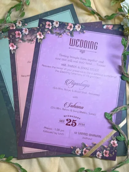 A beautiful example of a multi-event invitation suite. Each insert uses a different pastel shade, from purple to pink to green, while the floral theme keeps everything cohesive.