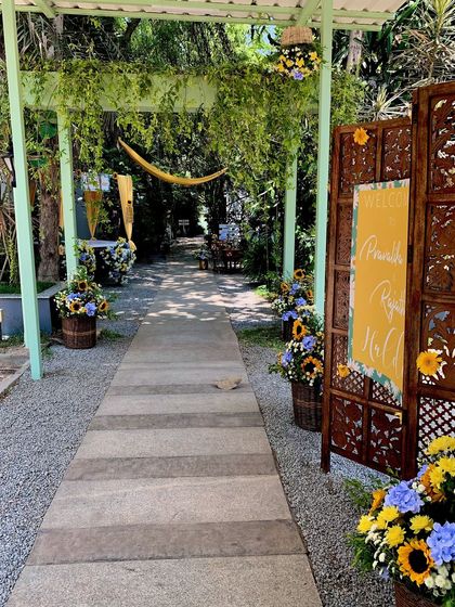 Another view of the sun-drenched pathway for the Haldi ceremony, creating a cheerful and inviting entrance.
